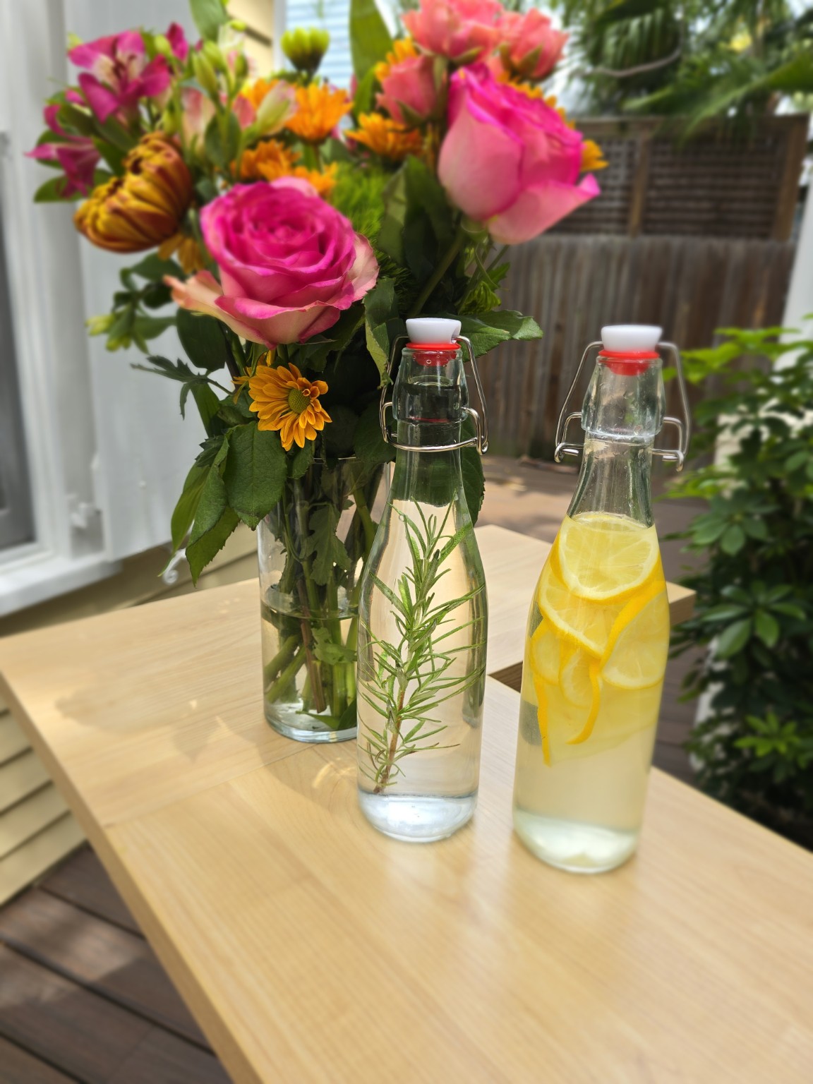 Fresh flowers and infused water on mobile bar